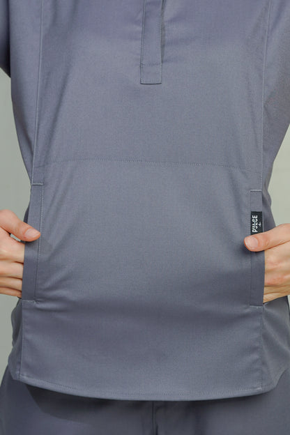 Gray short-sleeve shirt with a brand label on a plain background
