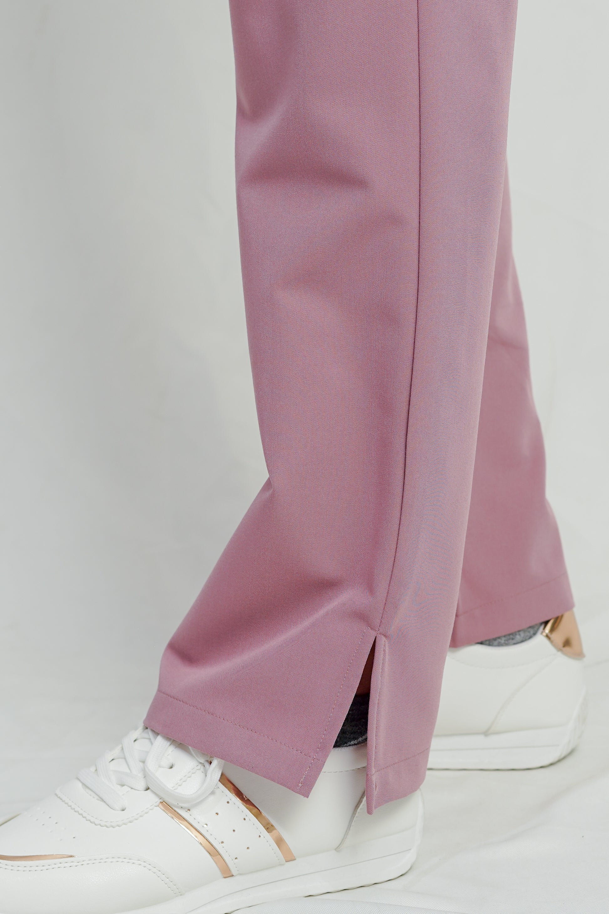 Pink pants with a white background
