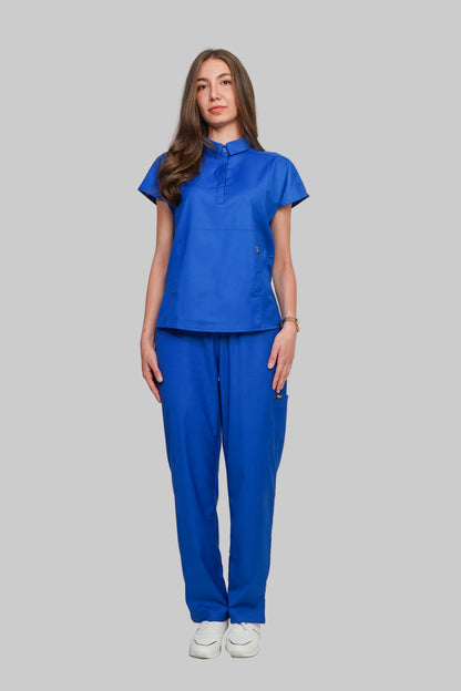 Person wearing a blue scrub set on a white background