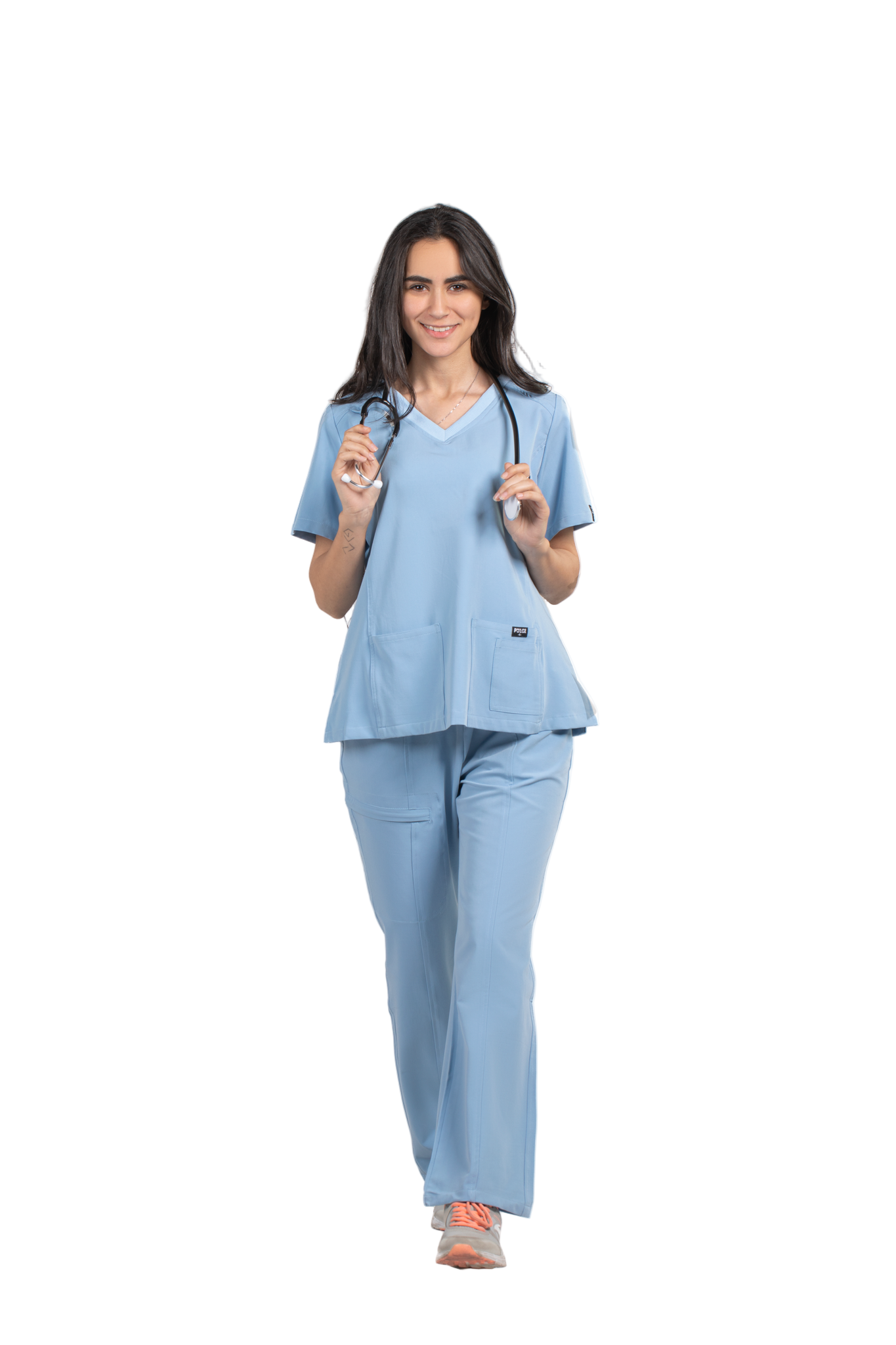 Woman wearing a light blue scrub set with 'Pulse' branding in the background